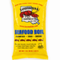 A yellow case pack of 25 LA Crawfish Co. seafood boil packets, featuring a crawfish illustration and boiling instructions.