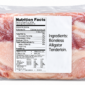 A 2 lb vacuum-sealed package of alligator tenderloin featuring a nutrition facts label.