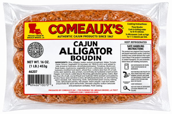 Three links of Comeaux’s Alligator Boudin in a vacuum-sealed plastic package with an informational label.