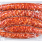Five links of coarse-ground Comeaux’s Smoked Andouille Sausage in a vacuum-sealed 5 lb clear plastic bag.