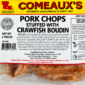 Vacuum-sealed Comeaux’s crawfish boudin stuffed pork chops featuring a label with ingredients and cooking instructions.