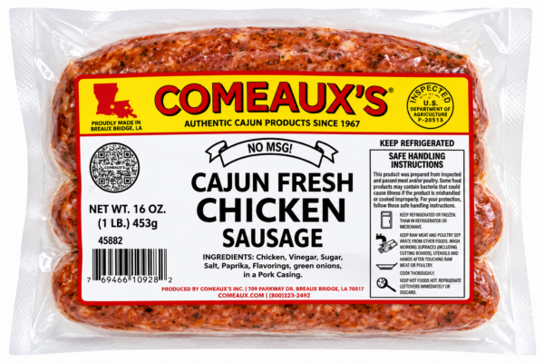 A vacuum-sealed package containing four links of raw, seasoned Comeaux’s Fresh Chicken Sausage.