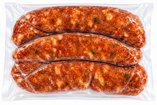 comeauxs fresh chicken sausage back Three vacuum-sealed links of Comeaux’s seasoned fresh chicken sausage.