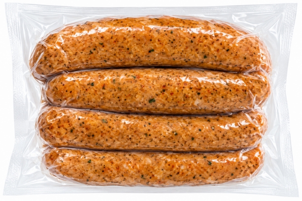comeauxs pork boudin extra hot back Four vacuum-sealed links of Comeaux’s Extra Hot Pork Boudin in clear plastic.