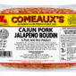 A vacuum-sealed package of raw Comeaux’s Pork Boudin jalapeno sausage links with visible jalapeno bits.