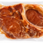 Vacuum-sealed package of Comeaux’s seasoned crawfish boudin stuffed pork chops.