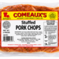 Seasoned Comeaux’s pork sausage stuffed pork chops in clear, vacuum-sealed packaging.