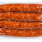 Four vacuum-sealed links of Comeaux’s Smoked Alligator & Pork Sausage.