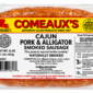 A package of Comeaux’s Smoked Alligator and Pork Sausage wrapped in clear plastic.