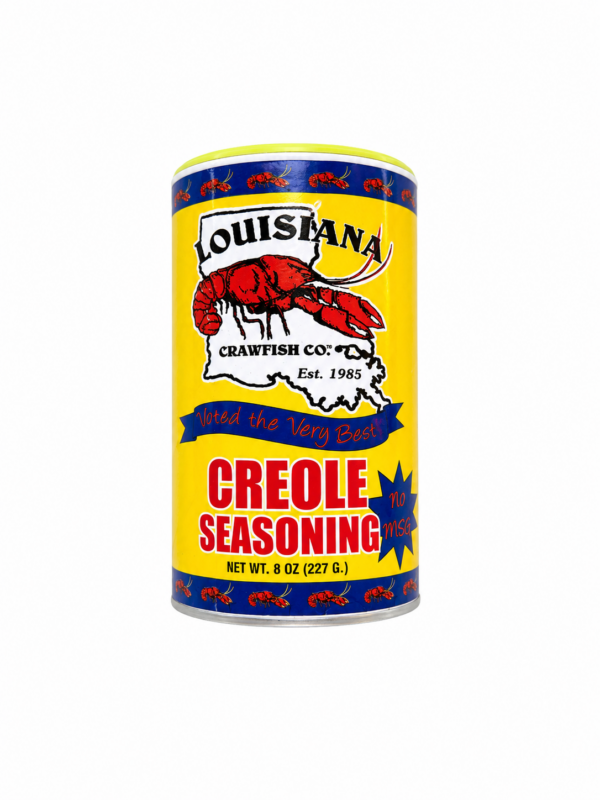 A yellow container of LA Crawfish Co. Creole Seasoning, featuring a red crawfish illustration over a Louisiana map.