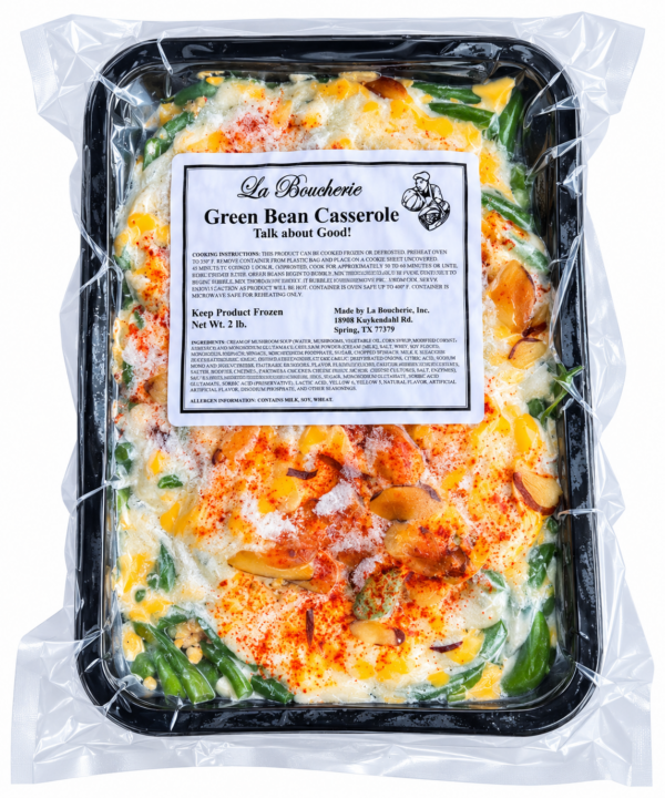 la boucherie green bean casserole front A 2 lb La Boucherie green bean casserole in a plastic container, topped with melted cheese, fried onions, and paprika.