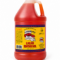 A gallon jug of LA Crawfish Co. Seafood Boil, featuring an orange liquid and a yellow label with a crawfish design.