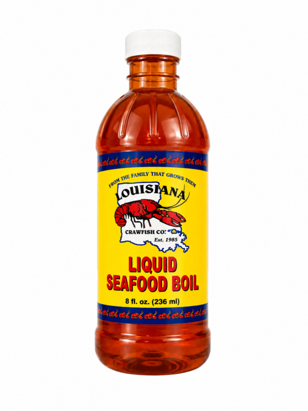 A 16oz bottle of LA Crawfish Co. Liquid Boil with a yellow label featuring a crawfish and a Louisiana map.