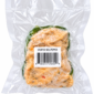 A Rachael’s Stuffed Bell Pepper in a vacuum-sealed bag with a labeled, barcoded product package.