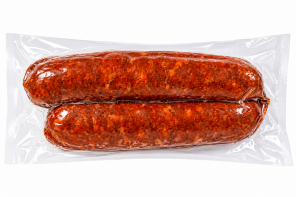 the best stop andouille back Two vacuum-sealed The Best Stop Smoked Andouille sausages in plastic packaging.