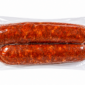 Two vacuum-sealed The Best Stop Smoked Andouille sausages in plastic packaging.