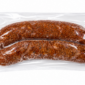 Two links of The Best Stop Smoked Boudin in a clear plastic package.