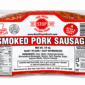 A link of The Best Stop Smoked Pork Sausage in a clear plastic package with a red label showing ingredients.