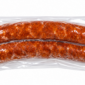 Two vacuum-sealed links of The Best Stop smoked pork sausage with garlic.