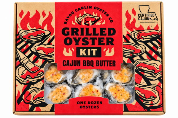 A dozen Grilled Oyster Kits with Cajun BBQ Butter, packaged in a box illustrated with flames and grills.