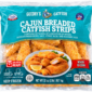 A 2 lb package of Guidry’s Breaded Catfish Strips, featuring a bowl of cooked fish, lemon, and parsley on the label.