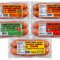 Five vacuum-sealed packages of Down Home Smoked Sausage with nutrition labels and flavor tags.