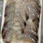 A tray of Anna Marie large peeled, deveined, tail-on shrimp—perfect for authentic Louisiana seafood recipes.