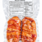 Two vacuum-sealed La Boucherie Bayou Boudin chicken portions, wrapped in bacon and labeled for nutrition.