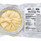 An uncooked, round La Boucherie Shrimp Pie in a foil tin with a nutrition label, all in a clear plastic package.
