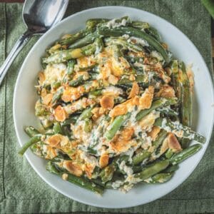 La Boucherie 1 lb Green Bean Casserole Side Dish with cheese and almonds, a great match for Louisiana seafood.