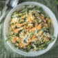 La Boucherie 1 lb Green Bean Casserole Side Dish with cheese and almonds, a great match for Louisiana seafood.