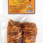 Vacuum-sealed La Boucherie Jazzy Dirty Rice Chicken stuffed with dirty rice and bacon, featuring Cajun flavors and cooking instructions.
