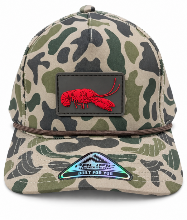 camo rubber patch Camo LA Crawfish Co. Coastland hat with a rectangular red crawfish PVC patch and a metallic visor sticker.
