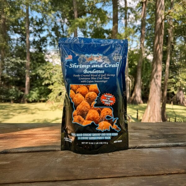 Cajun shrimp and crab boulettes served outdoors, highlighting bold Louisiana seafood flavors in each bite.