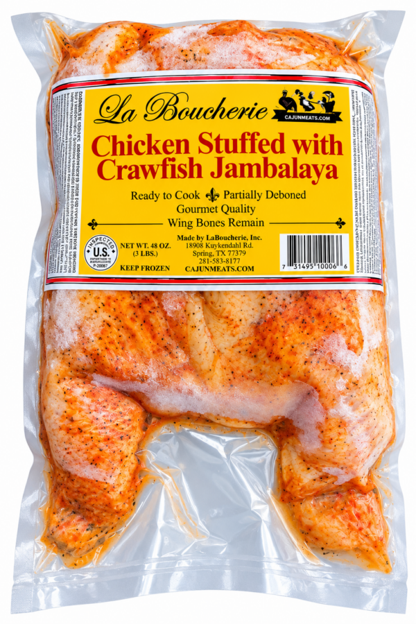 la boucherie stuffed chicken crawfish jambalaya front A raw, seasoned La Boucherie Cajun stuffed chicken with jambalaya, vacuum-sealed in a bag with a product label.