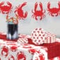 Luncheon napkins featuring red crab designs, ideal for serving Louisiana seafood or Cajun dishes at parties.