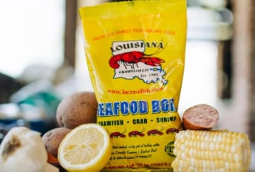 Louisiana Seafood Boil seasoning with lemon, potatoes, corn, garlic, and sausage—ideal for Cajun dishes like crawfish.