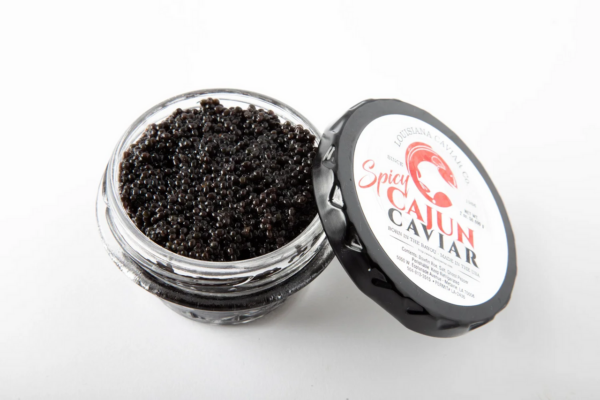 spicy__41023.1771372125.1280.1280.png An open jar of Cajun Caviar Spicy, inspired by Louisiana seafood, rests on a plain white background.