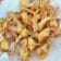 Lightly battered and fried Pontchartrain Jumbo Lump Crab Swimmers sit on a plate lined with paper towels.