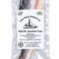 A vacuum-sealed filet of Anna Marie speckled trout in a clear plastic bag with a product label.